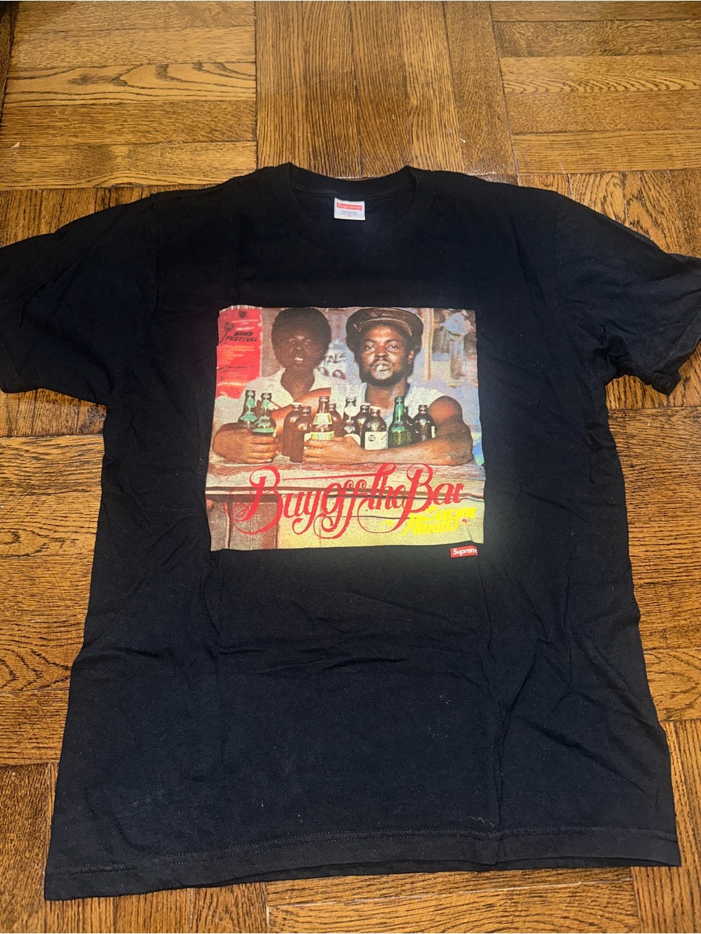 Supreme Black 'Buy Off the Bar' Graphic Tee